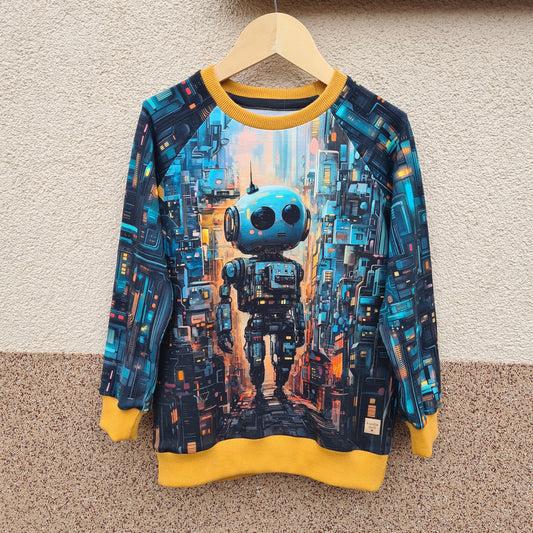 Ilustrácia robota na detskej mikine, inšpirovaná futuristickým mestom
